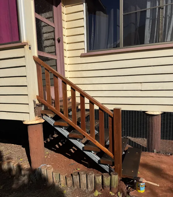 New timber stairs and handrail on a Queenslander
